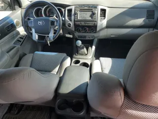 2013 Toyota Tacoma with VIN 5TFLU4EN7DX073036, listed as a Copart auction lot 52871485 with 114,809 mi miles and Salvage Title. Bid and sale history available at DreamBid. Image 8.