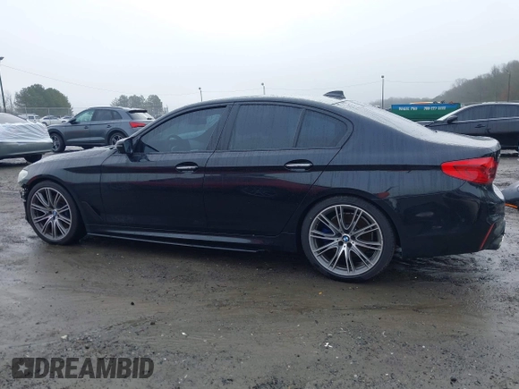 2018 BMW 5 Series M550i xDrive with VIN WBAJB9C59JB049114, listed as a IAAI auction lot 41543633 with 87,942 mi miles and . Bid and sale history available at carsss.com. Image 15.