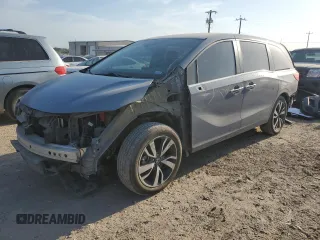 2023 Honda Odyssey Touring z VIN 5FNRL6H85PB001586, wystawiony jako Copart lot #53152585 z przebiegiem 37 927 mil mil oraz Czysty tytuł • Clean title. Historia ofert i sprzedaży dostępna na DreamBid. Obrazek 1.