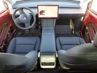 2024 Tesla Model Y Long Range with VIN 7SAYGDEE4RA257722, listed as a Copart auction lot 54577865 with 10,713 mi miles and Salvage Title. Bid and sale history available at DreamBid. Image 8.
