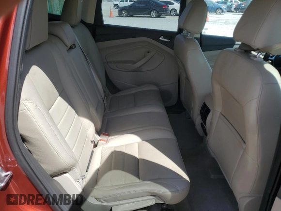 2015 Ford Escape Titanium with VIN 1FMCU0J93FUA66179, listed as a Copart auction lot 65235585 with 82,889 mi miles and Salvage title. Bid and sale history available at DreamBid. Image 11.