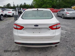 2014 Ford Fusion SE Hybrid with VIN 3FA6P0LU3ER312041, listed as a IAAI auction lot 41964588 with 138,566 mi miles and . Bid and sale history available at DreamBid. Image 16.