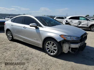 2017 Ford Fusion Hybrid SE with VIN 3FA6P0LU8HR355455, listed as a Copart auction lot 60469935 with 183,105 mi miles and Salvage title. Bid and sale history available at DreamBid. Image 4.