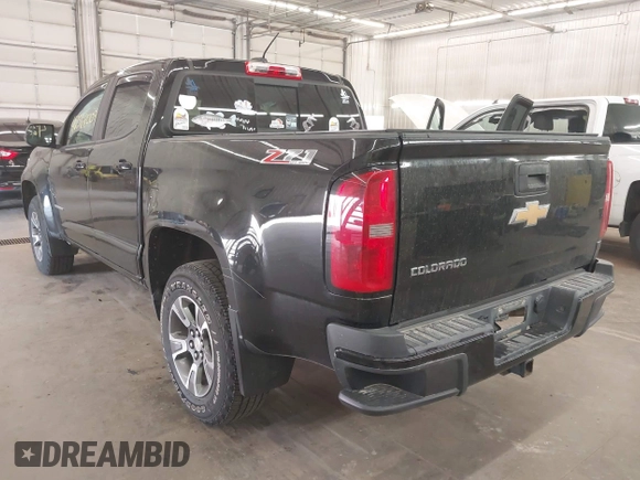 2016 Chevrolet Colorado 4WD Z71 with VIN 1GCGTDE32G1364053, listed as a IAAI auction lot 42368009 with 129,923 mi miles and . Bid and sale history available at DreamBid. Image 3.