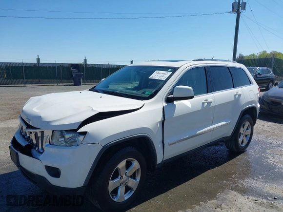 2011 Jeep Grand Cherokee Laredo with VIN 1J4RR4GG3BC736370, listed as a IAAI auction lot 42053862 with 169,269 mi miles and . Bid and sale history available at DreamBid. Image 17.