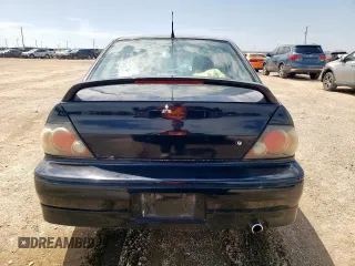 2002 Mitsubishi Lancer OZ-Rally z VIN JA3AJ86E32U001737, wystawiony jako Copart lot #59275695 z przebiegiem 177 332 mil mil oraz Szkoda całkowita • Salvage title. Historia ofert i sprzedaży dostępna na DreamBid. Obrazek 6.