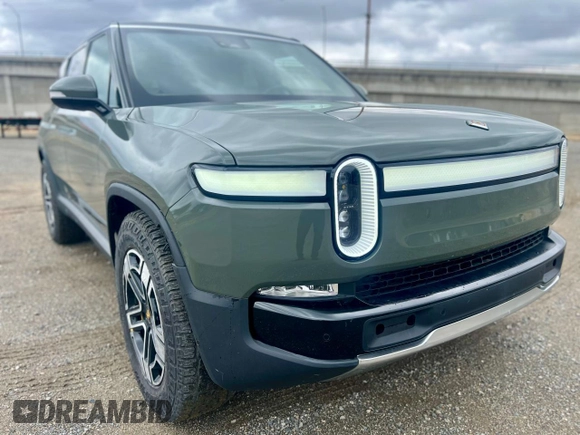 2023 Rivian R1S Launch Edition with VIN 7PDSGABL2PN003733, listed as a Copart auction lot 56033315 with 9,996 mi miles and Salvage Title. Bid and sale history available at carsss.com. Image 1.