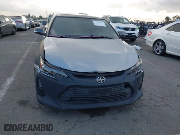 2014 Scion tC z VIN JTKJF5C79E3073875, wystawiony jako IAAI lot #41536021 z przebiegiem 158 154 mil mil oraz . Historia ofert i sprzedaży dostępna na DreamBid. Obrazek 12.