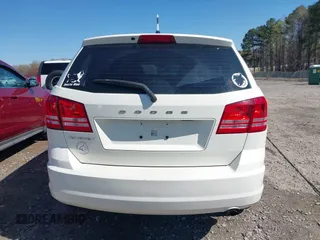 2013 Dodge Journey SE with VIN 3C4PDCAB0DT695464, listed as a IAAI auction lot 41899206 with 311,327 mi miles. Bid and sale history available at carsss.com. Image 16.