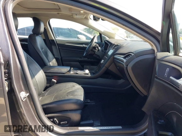 2019 Ford Fusion Titanium with VIN 3FA6P0D91KR104827, listed as a IAAI auction lot 42221526 with 141,316 mi miles and . Bid and sale history available at DreamBid. Image 5.