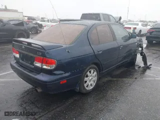 2002 Infiniti G20 Luxury with VIN JNKCP11A32T503995, listed as a IAAI auction lot 41802931 with 209,145 mi miles. Bid and sale history available at carsss.com. Image 4.