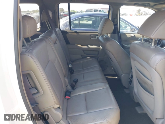 2009 Honda Pilot EX-L with VIN 5FNYF48619B022699, listed as a IAAI auction lot 42016173 with 204,190 mi miles and . Bid and sale history available at carsss.com. Image 8.