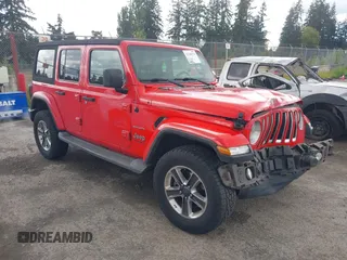 2018 Jeep Wrangler Unlimited Sahara z VIN 1C4HJXEG1JW310817, wystawiony jako IAAI lot #42248374 z przebiegiem 64 516 mil mil oraz . Historia ofert i sprzedaży dostępna na DreamBid. Obrazek 1.