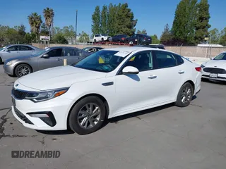 2019 Kia Optima LX with VIN 5XXGT4L33KG324175, listed as a IAAI auction lot 42139795 with 105,273 mi miles. Bid and sale history available at carsss.com. Image 17.