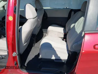 2014 Mazda 5 Sport with VIN JM1CW2BL9E0168662, listed as a IAAI auction lot 42726429 with 145,190 mi miles and . Bid and sale history available at DreamBid. Image 8.