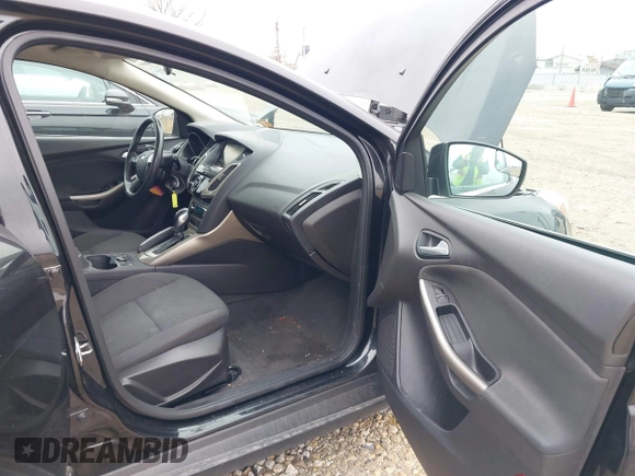 2012 Ford Focus SEL with VIN 1FAHP3M28CL336001, listed as a IAAI auction lot 40876771 with 147,017 mi miles. Bid and sale history available at carsss.com. Image 5.
