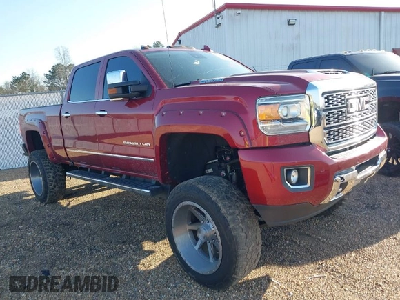 2018 GMC Sierra 2500HD Denali z VIN 1GT12UEY6JF272619, wystawiony jako IAAI lot #41743216 z przebiegiem 165 231 mil mil oraz . Historia ofert i sprzedaży dostępna na DreamBid. Obrazek 1.