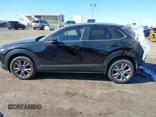 2024 Mazda CX-30 S Carbon Edition with VIN 3MVDMBCM4RM607530, listed as a IAAI auction lot 41796426 with 3,715 mi miles and . Bid and sale history available at DreamBid. Image 14.