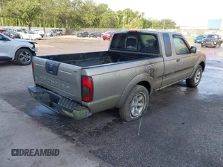 2002 Nissan Frontier XE with VIN 1N6DD26S42C313576, listed as a IAAI auction lot 42311352 with 186,341 mi miles and . Bid and sale history available at DreamBid. Image 4.