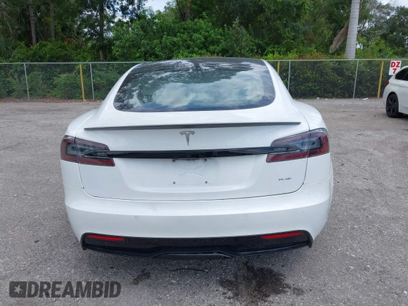 2022 Tesla Model S Plaid with VIN 5YJSA1E61NF460155, listed as a IAAI auction lot 42545167 with 51,711 mi miles and . Bid and sale history available at DreamBid. Image 16.