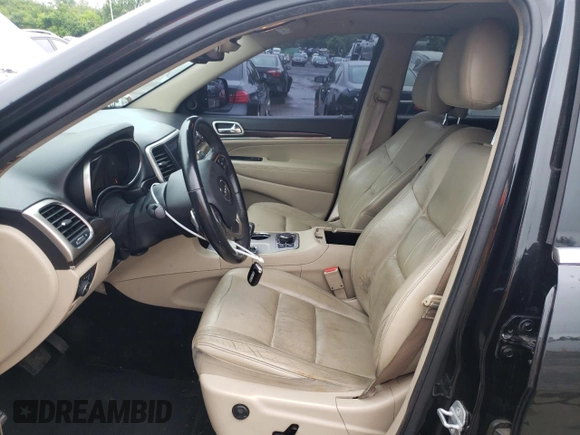 2014 Jeep Grand Cherokee Limited z VIN 1C4RJFBG7EC546642, wystawiony jako Copart lot #61445615 z przebiegiem 128 921 mil mil oraz Szkoda całkowita • Salvage title. Historia ofert i sprzedaży dostępna na DreamBid. Obrazek 7.