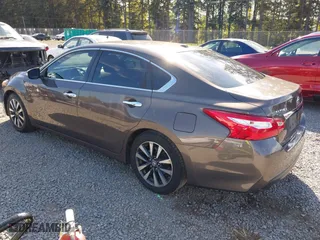 2017 Nissan Altima 2.5 SR with VIN 1N4AL3AP8HC180059, listed as a IAAI auction lot 42075133 with 197,955 mi miles. Bid and sale history available at carsss.com. Image 3.