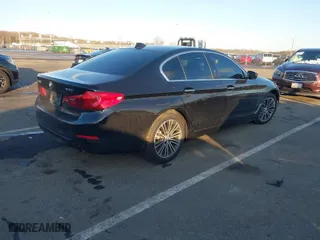 2018 BMW 5 Series 530i xDrive with VIN WBAJA7C58JWA72127, listed as a IAAI auction lot 41548417 with 80,680 mi miles. Bid and sale history available at carsss.com. Image 4.