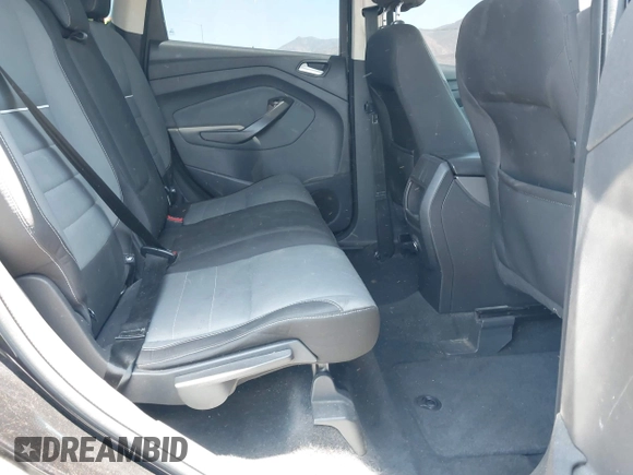 2013 Ford Escape SE z VIN 1FMCU0GX5DUA13261, wystawiony jako IAAI lot #42548111 z przebiegiem 183 037 mil mil oraz . Historia ofert i sprzedaży dostępna na DreamBid. Obrazek 8.