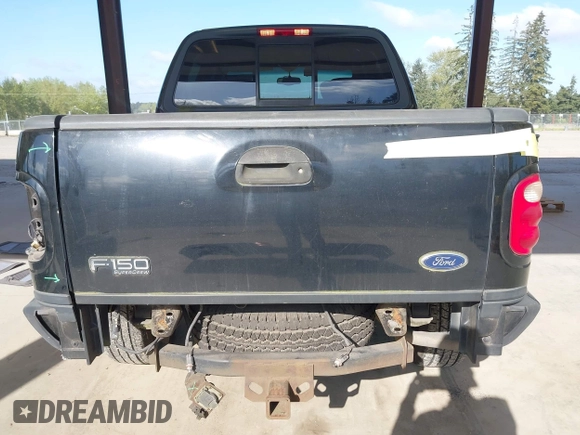 2002 Ford F-150 XLT with VIN 1FTRW08L92KD75087, listed as a IAAI auction lot 41960331 with 1 mi miles. Bid and sale history available at carsss.com. Image 6.