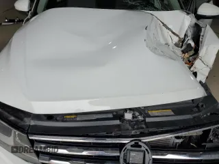 2021 Volkswagen Tiguan S z VIN 3VV0B7AX4MM040312, wystawiony jako Copart lot #51365005 z przebiegiem 40 996 mil mil oraz Szkody całkowita. Historia ofert i sprzedaży dostępna na DreamBid. Obrazek 13.