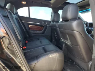 2014 Lincoln MKS with VIN 1LNHL9EK6EG604428, listed as a Copart auction lot 59758884 with 122,833 mi miles and Salvage Title. Bid and sale history available at carsss.com. Image 11.