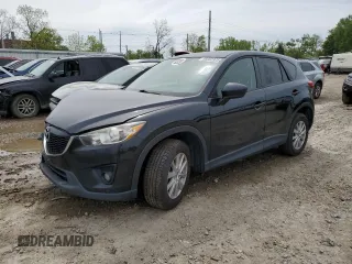 2014 Mazda CX-5 Touring z VIN JM3KE2CYXE0395472, wystawiony jako Copart lot #58232325 z przebiegiem 149 159 mil mil oraz Czysty tytuł • Clean title. Historia ofert i sprzedaży dostępna na DreamBid. Obrazek 1.
