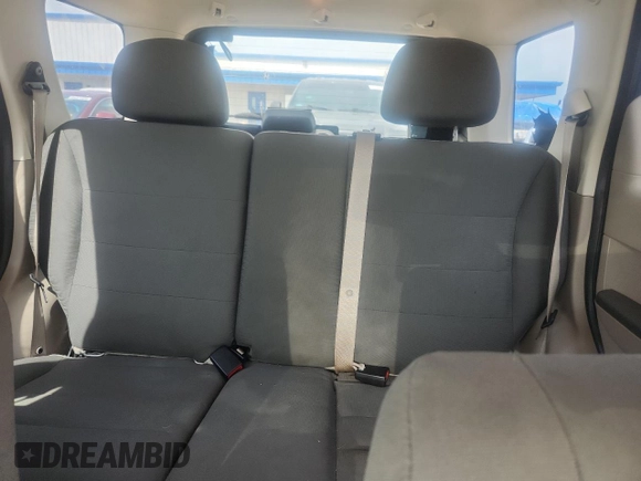 2012 Ford Escape XLS z VIN 1FMCU0C79CKC84677, wystawiony jako Copart lot #64234045 z przebiegiem 138 562 mil mil oraz Czysty tytuł • Clean title. Historia ofert i sprzedaży dostępna na DreamBid. Obrazek 10.