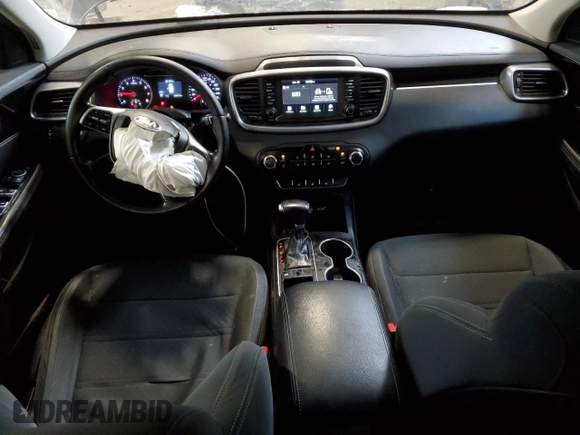 2019 Kia Sorento LX z VIN 5XYPG4A32KG548492, wystawiony jako Copart lot #61574165 z przebiegiem 134 672 mil mil oraz Szkoda całkowita • Salvage title. Historia ofert i sprzedaży dostępna na DreamBid. Obrazek 8.