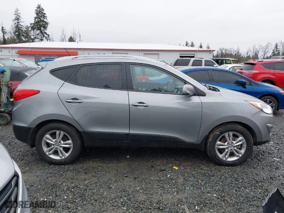 2011 Hyundai Tucson Limited with VIN KM8JUCAC7BU315680, listed as a IAAI auction lot 41577234 with 32,558 mi miles. Bid and sale history available at carsss.com. Image 13.