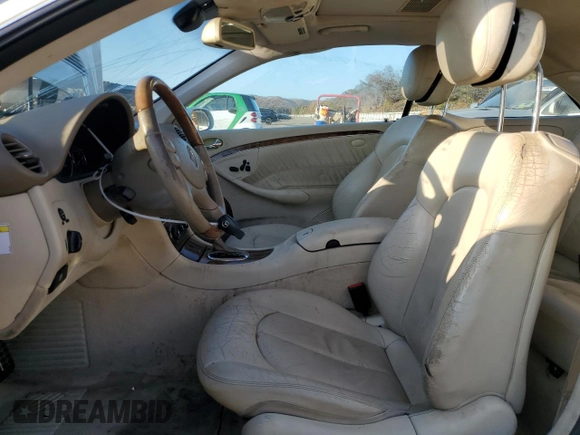 2006 Mercedes-Benz CLK-Class 3.5L with VIN WDBTJ56J76F171100, listed as a Copart auction lot 77068234 with 86,635 mi miles and Salvage Title. Bid and sale history available at carsss.com. Image 7.