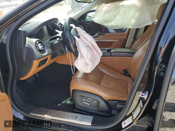 2012 Jaguar XJ with VIN SAJWA1CB2CLV38648, listed as a Copart auction lot 50264545 with Not Provided miles and Salvage Title. Bid and sale history available at DreamBid. Image 7.