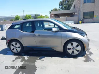 2014 BMW i3 with VIN WBY1Z4C56EV276183, listed as a IAAI auction lot 42345866 with 102,934 mi miles and . Bid and sale history available at DreamBid. Image 14.