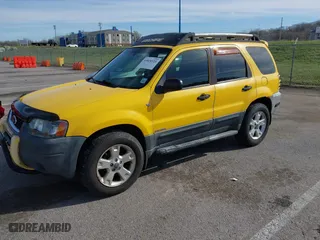 2003 Ford Escape XLT Popular 2 with VIN 1FMCU93153KC03710, listed as a IAAI auction lot 41834521 with 168,027 mi miles. Bid and sale history available at carsss.com. Image 2.