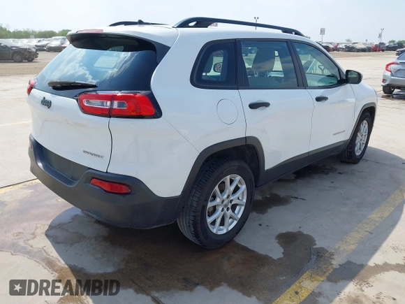2015 Jeep Cherokee Sport with VIN 1C4PJLAB6FW602355, listed as a IAAI auction lot 41962707 with 175,428 mi miles. Bid and sale history available at carsss.com. Image 4.