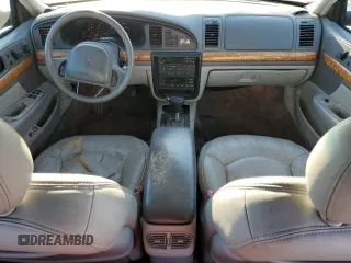 1999 Lincoln Continental with VIN 1LNHM97V2XY719495, listed as a Copart auction lot 42239665 with 234,544 mi miles and Salvage Title. Bid and sale history available at carsss.com. Image 8.