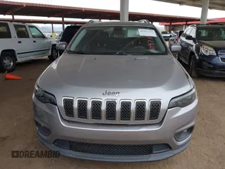 2019 Jeep Cherokee Latitude Plus with VIN 1C4PJLLB9KD109711, listed as a IAAI auction lot 41917339 with 115,320 mi miles. Bid and sale history available at carsss.com. Image 6.