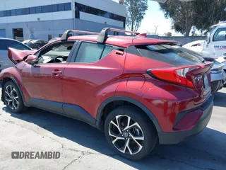 2019 Toyota C-HR XLE with VIN JTNKHMBX1K1060316, listed as a IAAI auction lot 41764464 with 42,956 mi miles. Bid and sale history available at carsss.com. Image 3.