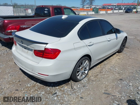 2014 BMW 3 Series 320i with VIN WBA3B1C51EK132083, listed as a IAAI auction lot 41985295 with 158,626 mi miles. Bid and sale history available at carsss.com. Image 4.