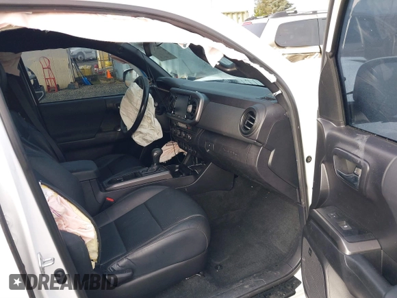 2021 Toyota Tacoma SR z VIN 3TMCZ5AN2MM426723, wystawiony jako IAAI lot #41604033 z przebiegiem 46 522 mil mil oraz . Historia ofert i sprzedaży dostępna na DreamBid. Obrazek 5.
