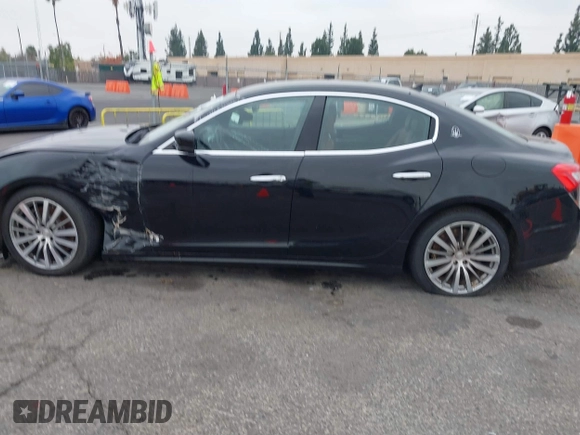 2015 Maserati Ghibli z VIN ZAM57XSA4F1151843, wystawiony jako IAAI lot #38392898 z przebiegiem 88 147 mil mil oraz . Historia ofert i sprzedaży dostępna na DreamBid. Obrazek 14.