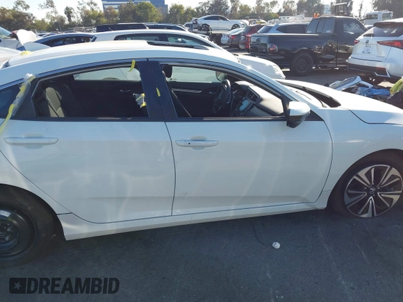 2017 Honda Civic EX-T with VIN 19XFC1E38HE002205, listed as a IAAI auction lot 40891678 with 10,398 mi miles and . Bid and sale history available at DreamBid. Image 13.