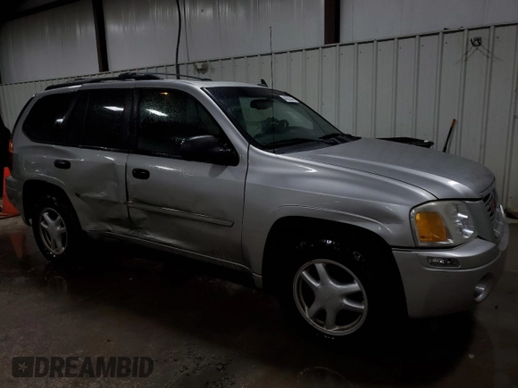 2007 GMC Envoy SLT with VIN 1GKDT13S572310014, listed as a Copart auction lot 44322845 with 152,489 mi miles and Salvage Title. Bid and sale history available at carsss.com. Image 4.