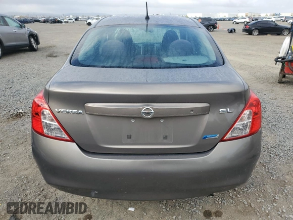 2012 Nissan Versa SL with VIN 3N1CN7AP9CL931299, listed as a Copart auction lot 51016705 with 153,723 mi miles and Salvage title. Bid and sale history available at DreamBid. Image 6.
