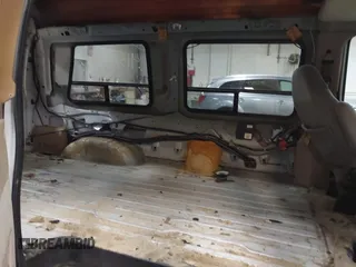 1997 Ford Econoline Commercial with VIN 1FDEE1464VHB97349, listed as a IAAI auction lot 41328090 with 72,788 mi miles. Bid and sale history available at carsss.com. Image 8.
